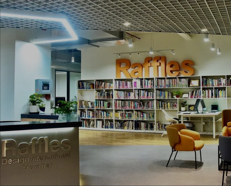 Raffles interior project with reception, library shelving and lounge seating